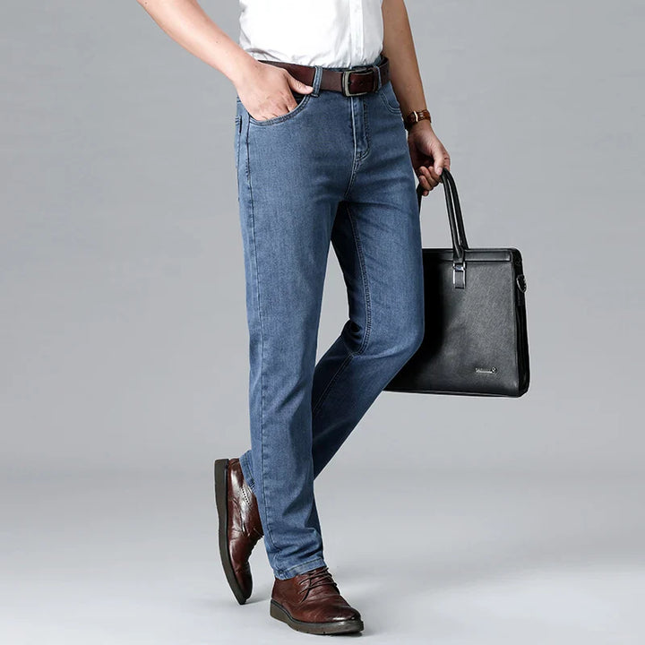 Men's Stretch Slim Fit Mid-Rise Tapered Denim Jeans