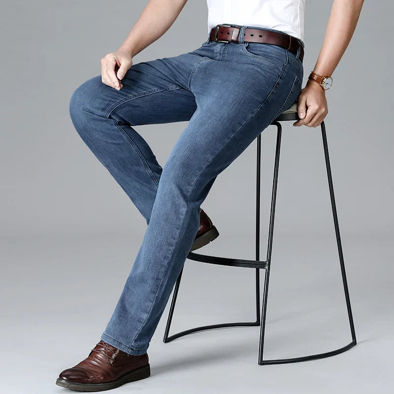 Men's Stretch Slim Fit Mid-Rise Tapered Denim Jeans
