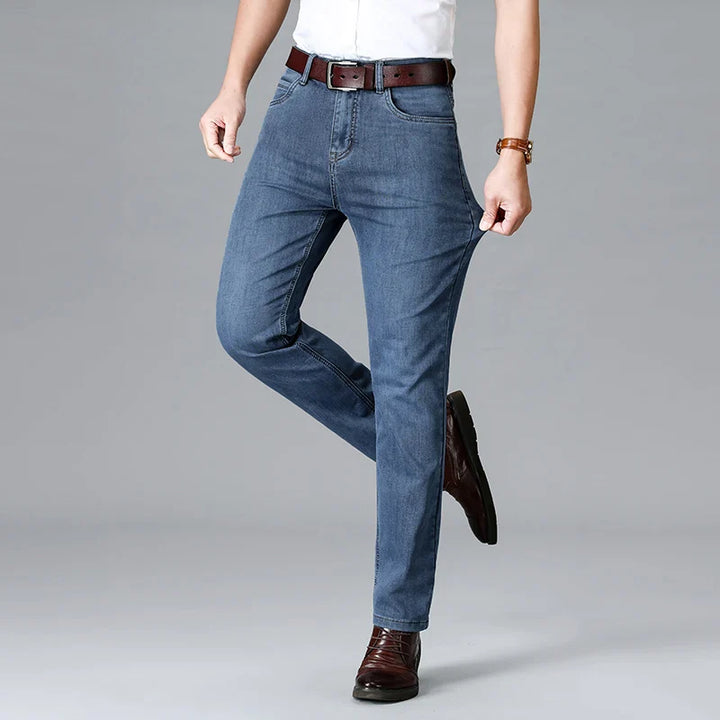 Men's Stretch Slim Fit Mid-Rise Tapered Denim Jeans