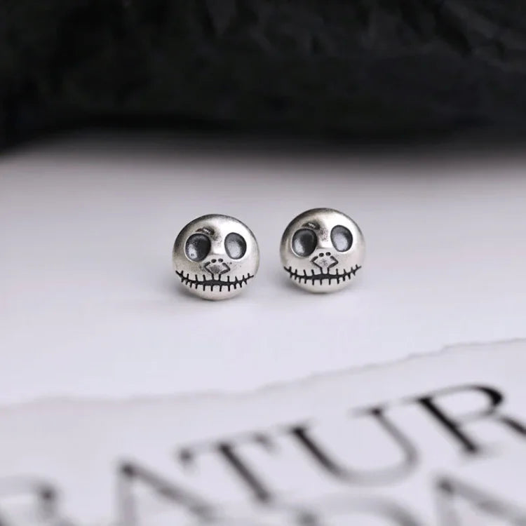 Halloween's Sterling Silver Skull Earrings with Pumpkin Design
