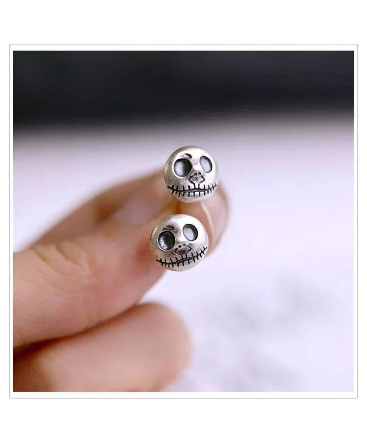 Halloween's Sterling Silver Skull Earrings with Pumpkin Design