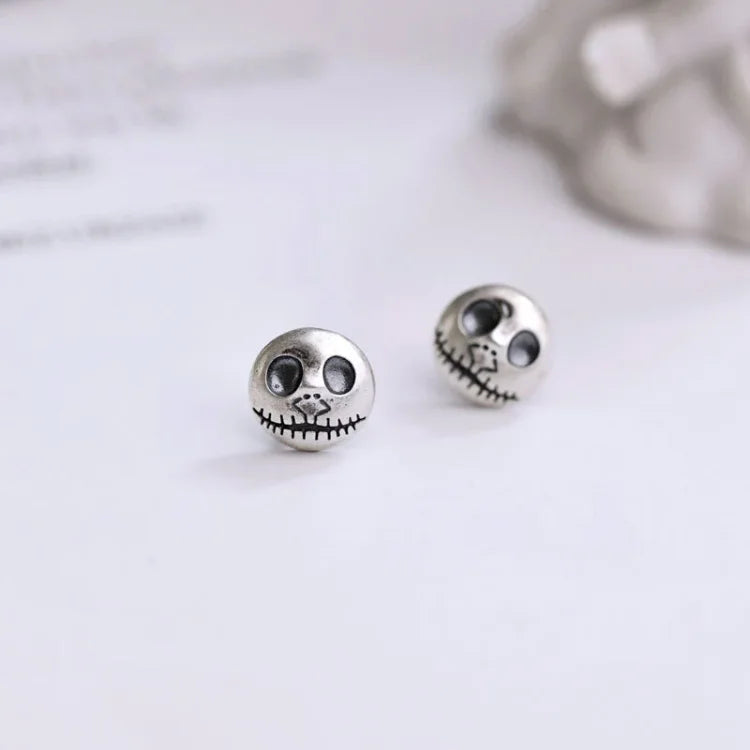 Halloween's Sterling Silver Skull Earrings with Pumpkin Design