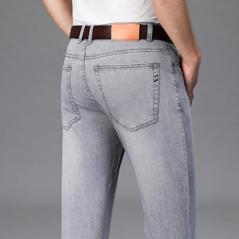 Men's Stretch Slim Fit Mid-Rise Tapered Denim Jeans