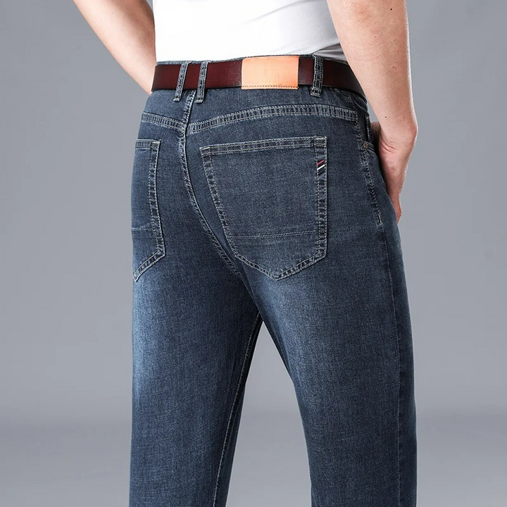 Men's Stretch Slim Fit Mid-Rise Tapered Denim Jeans