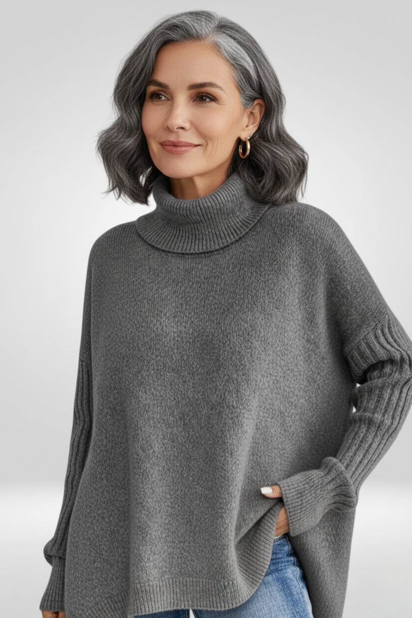 Women's Oversized Turtleneck Sweater with Asymmetric Hem Design