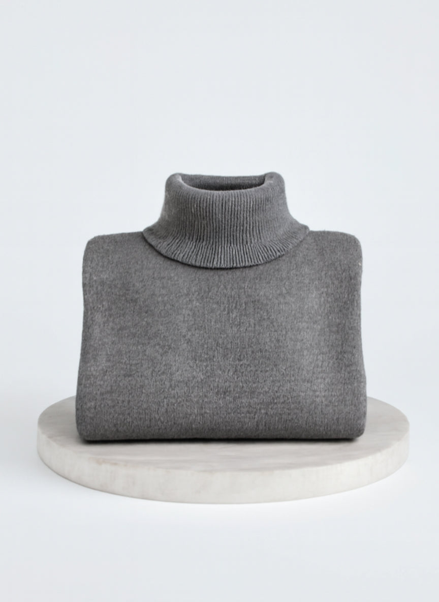 Women's Oversized Turtleneck Sweater with Asymmetric Hem Design