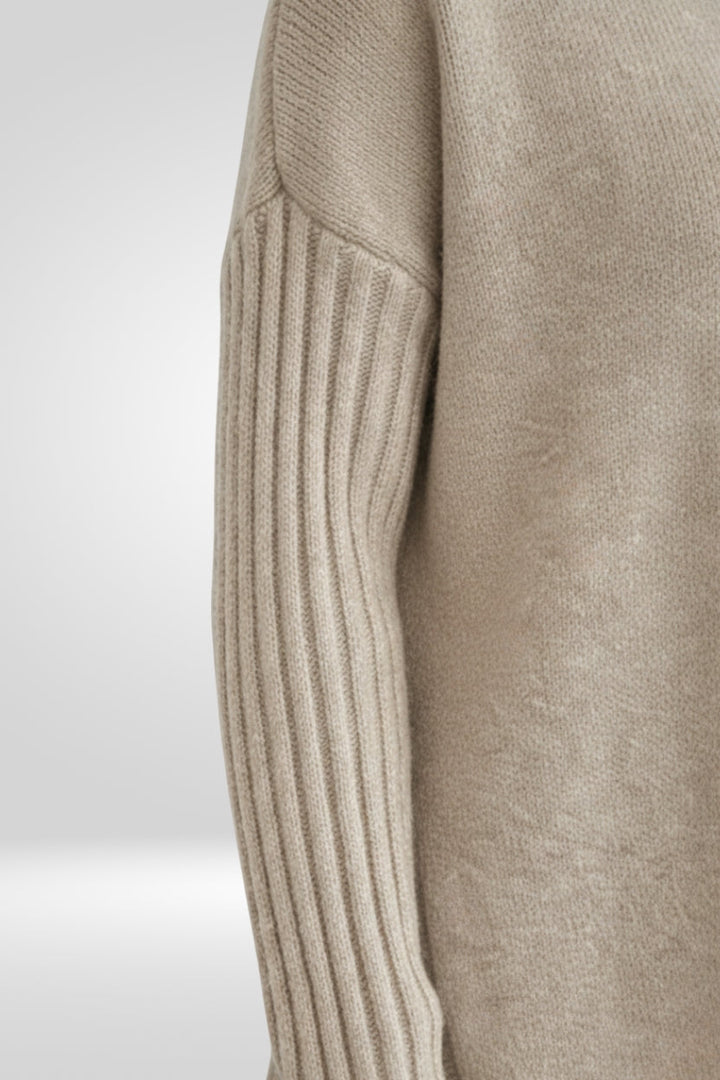 Women's Oversized Turtleneck Sweater with Asymmetric Hem Design